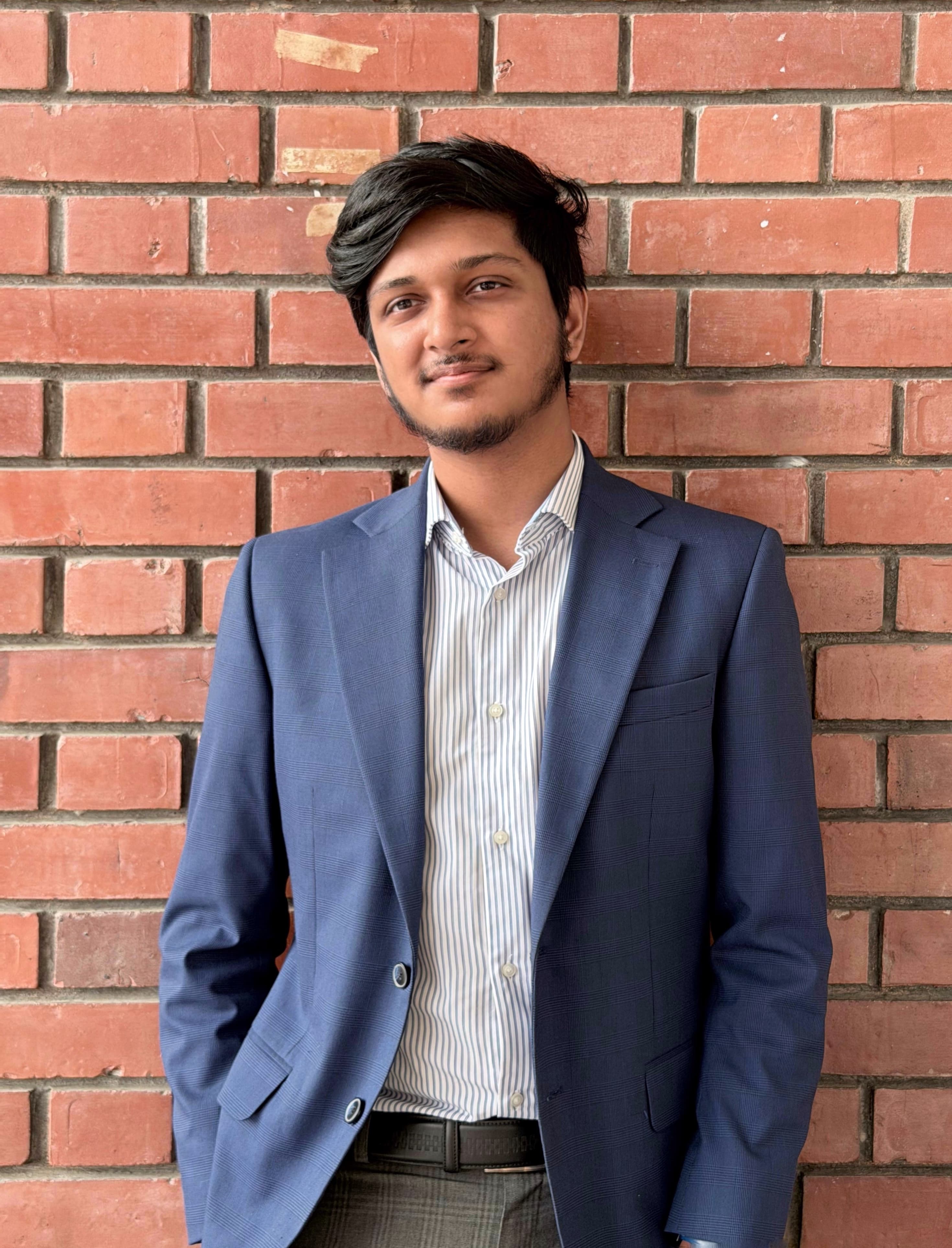 Navid Zaman Khan in professional attire